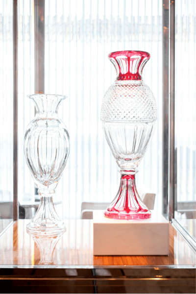 The Harcourt Red Grand Genre vase adorned with the well-known flat cut from the crystal service born in 1841. 