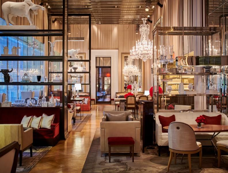 Inside The Baccarat Grand Salon with beautiful decor and plenty of sitting areas