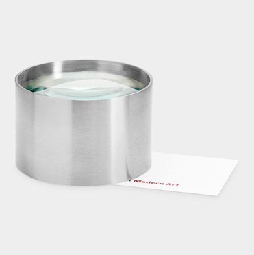 Page 1 Magnifier & Paperweight.