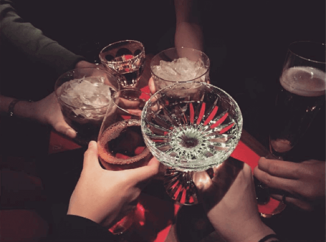 Raising a toast with beautiful crystal glasses in hand at B Bar in Tokyo.