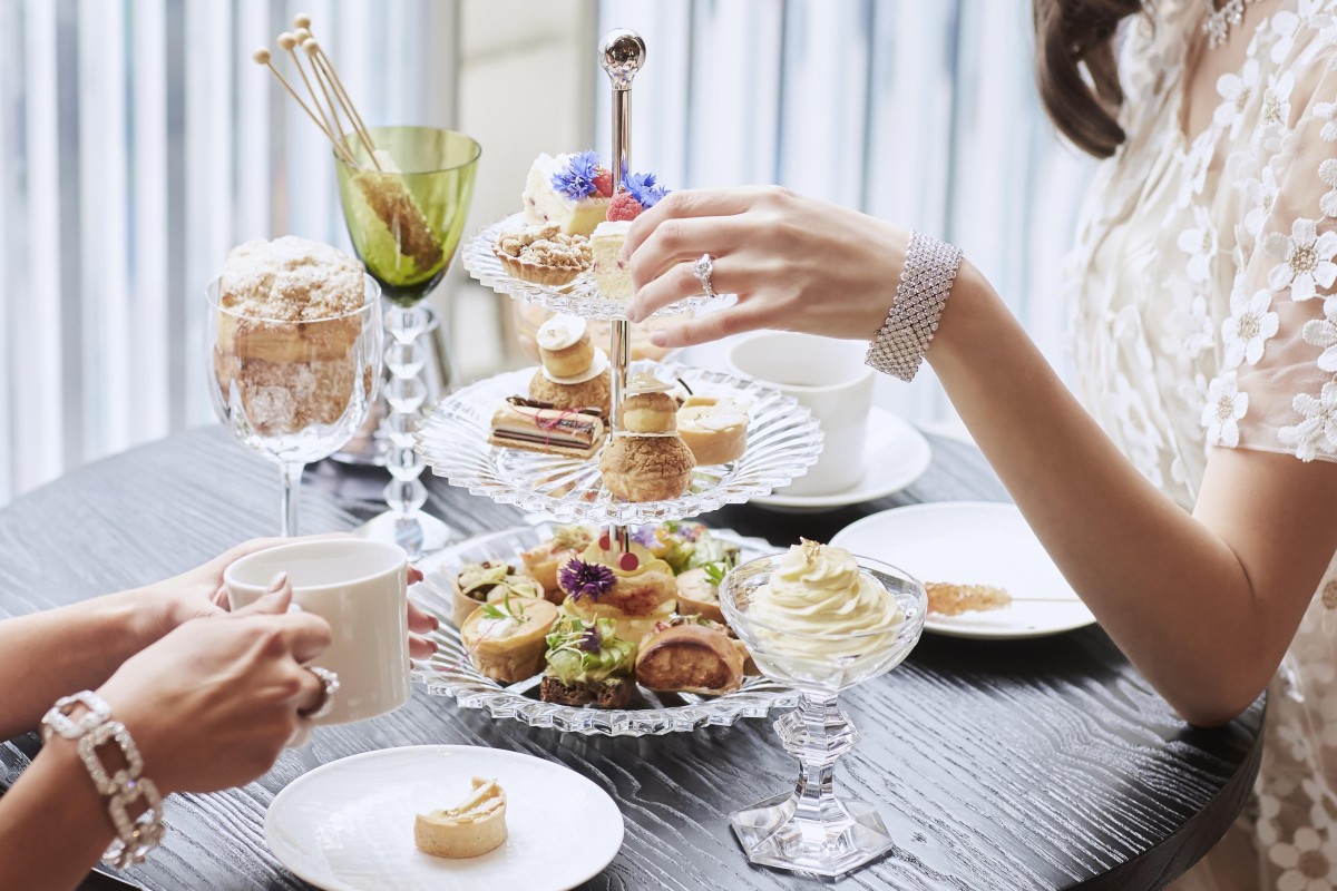 People eating an array of sweets