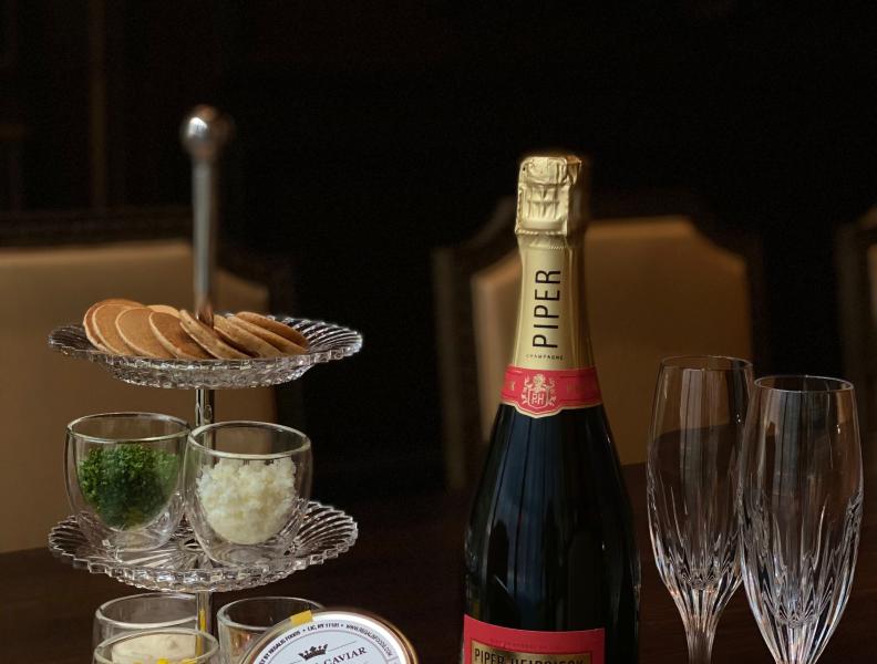 Indulge in this traditional caviar service with all the accoutrements