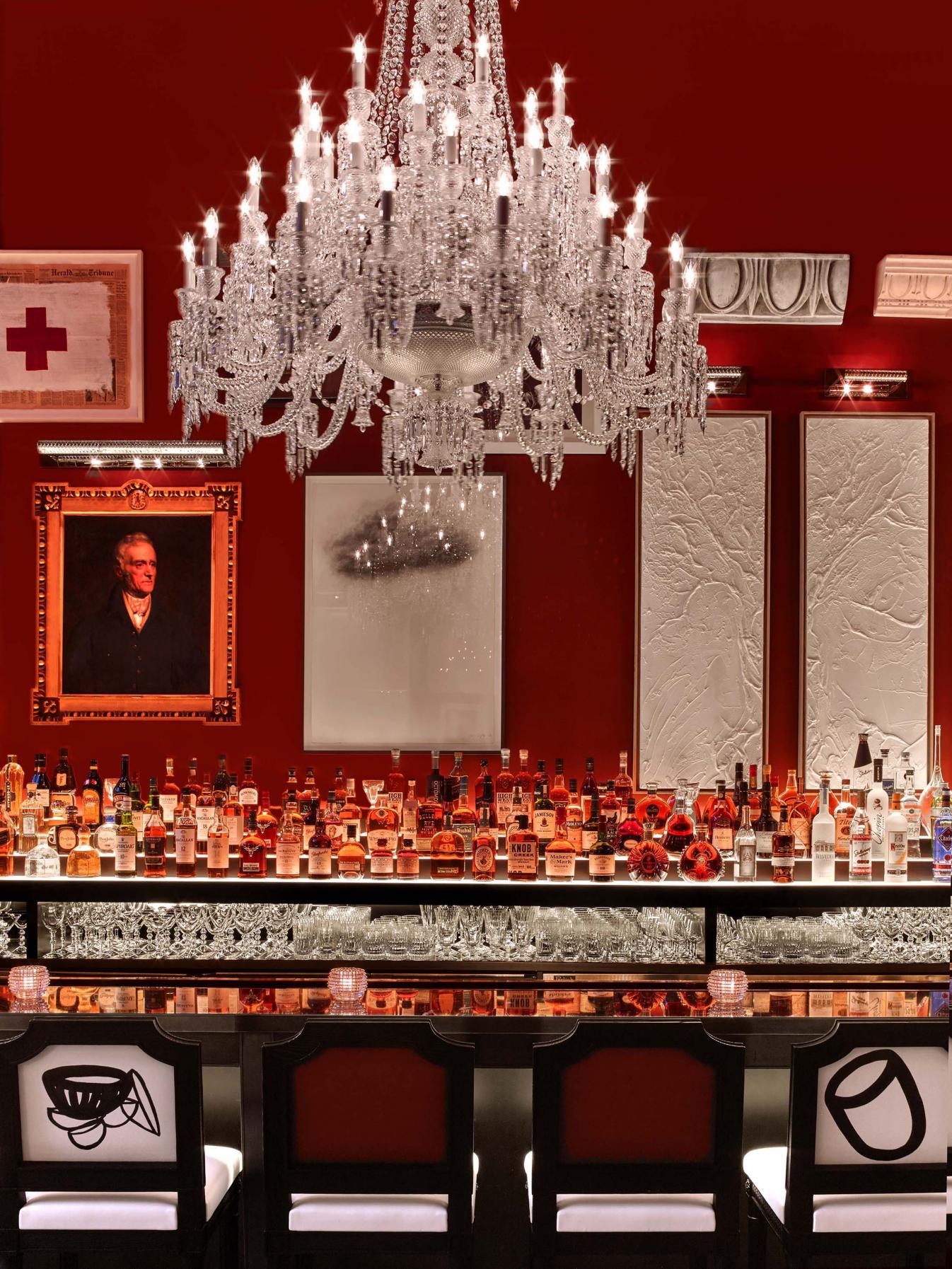 A crystal chandelier over the bar at Baccarat hotel