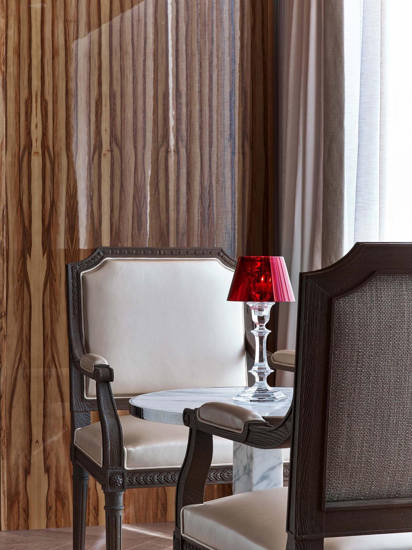 Baccarat hotel room Baccarat suite chairs and small marble table