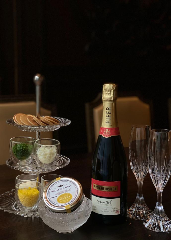 Indulge in this traditional caviar service with all the accoutrements