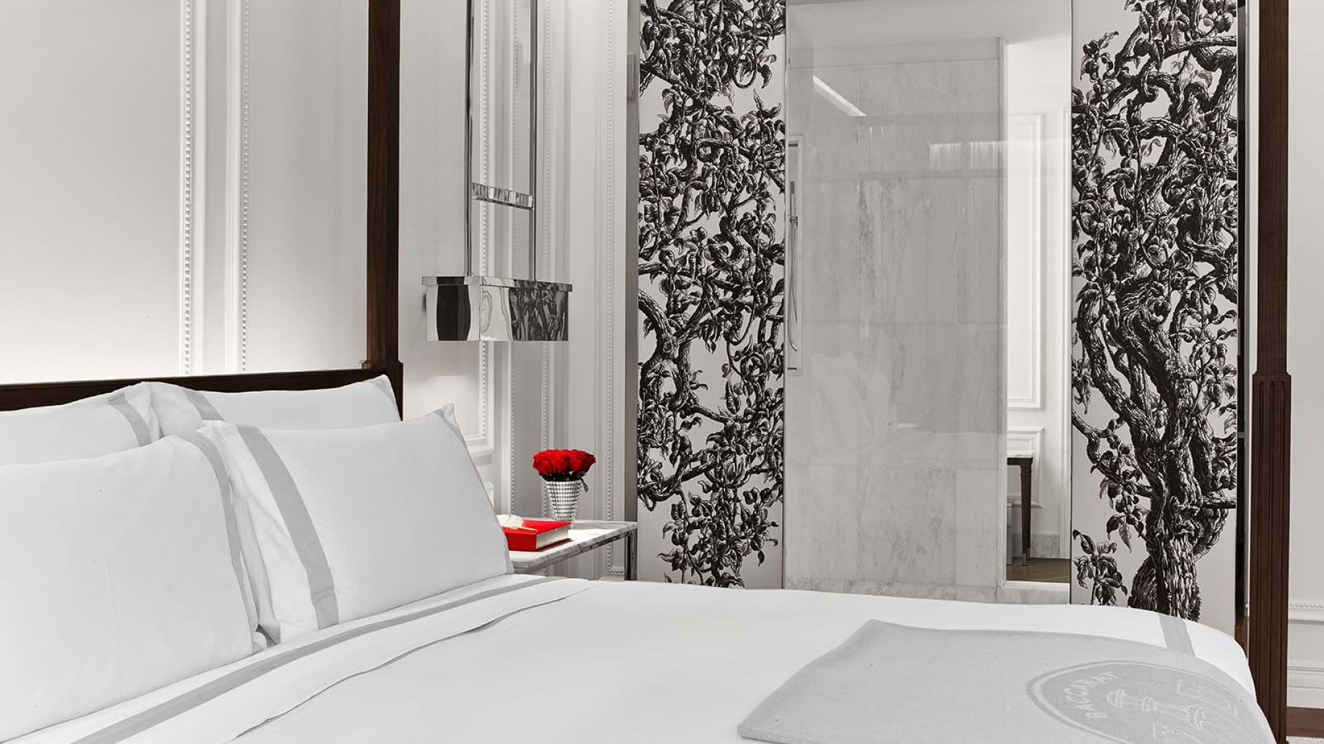 A view of. bed in a suite
