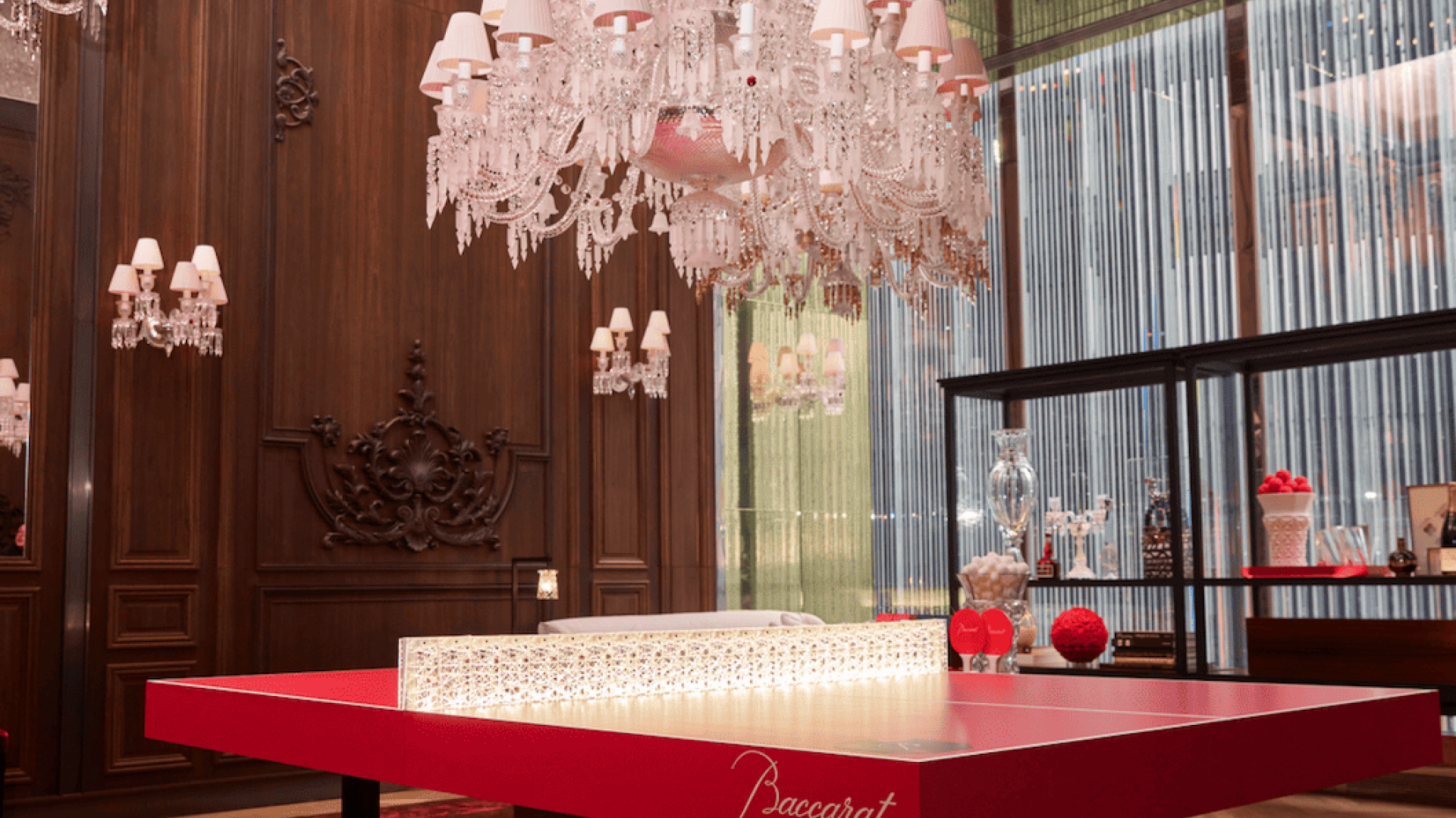 A chandelier above a table