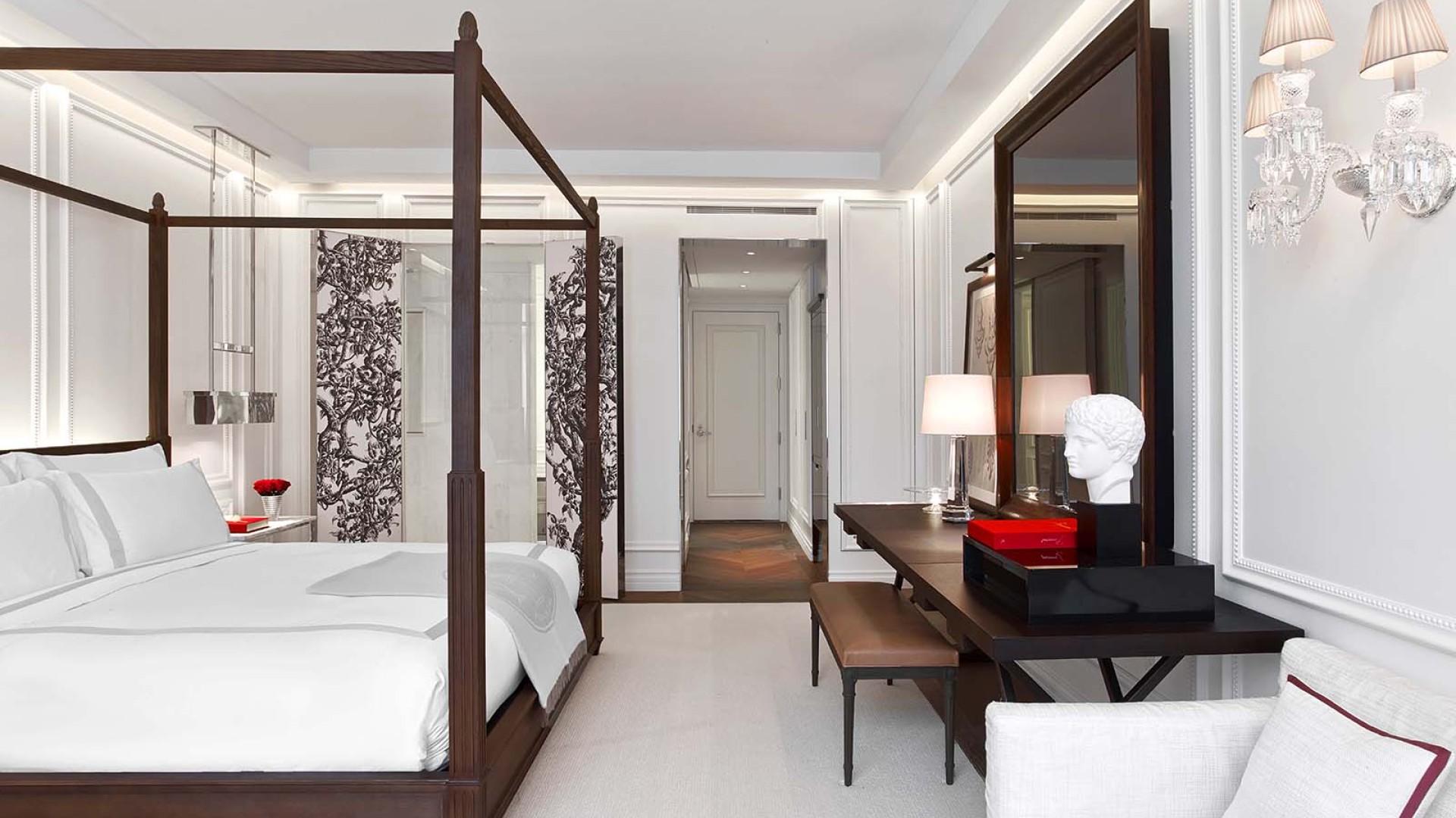 King bed with canopy and living space