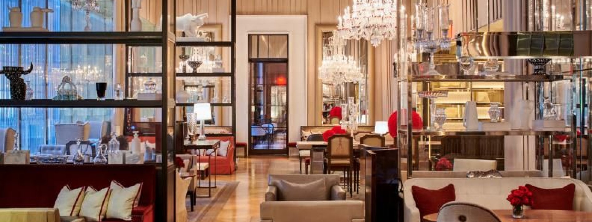 Inside The Baccarat Grand Salon with beautiful decor and plenty of sitting areas