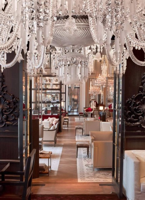 A large chandelier over a table