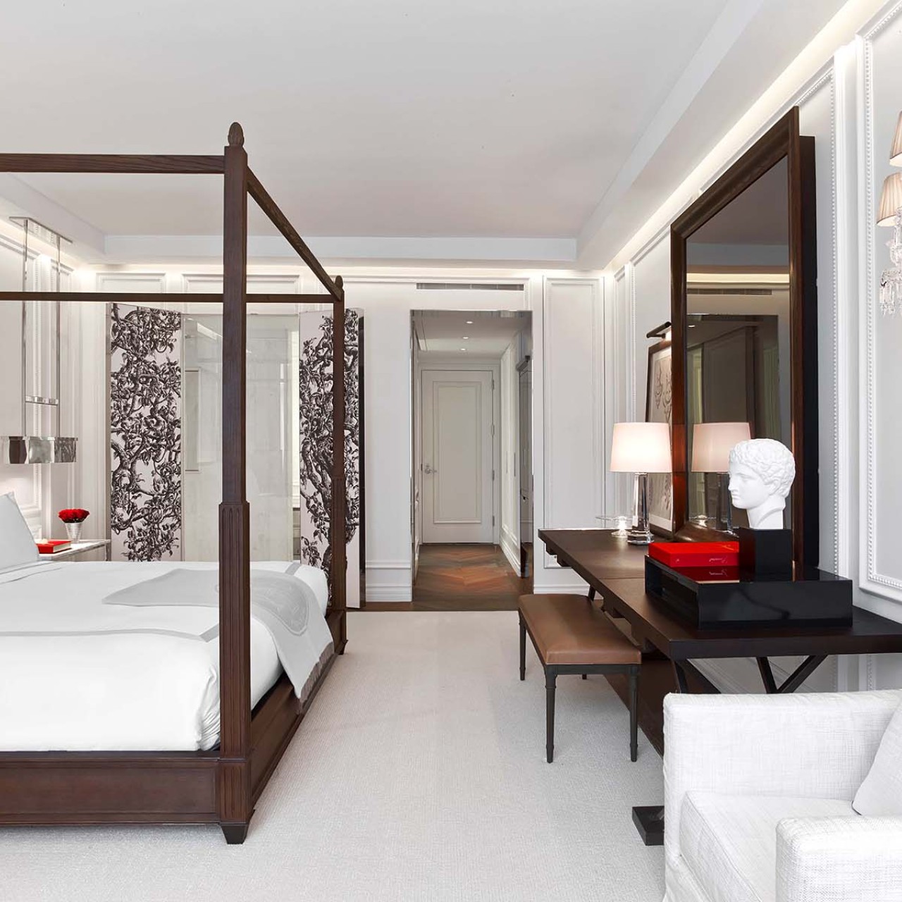 King bed with canopy and living space