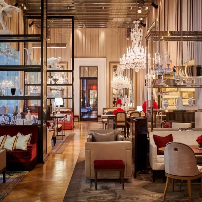 Inside The Baccarat Grand Salon with beautiful decor and plenty of sitting areas