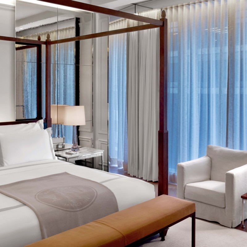 Classic King room with a chair and bed