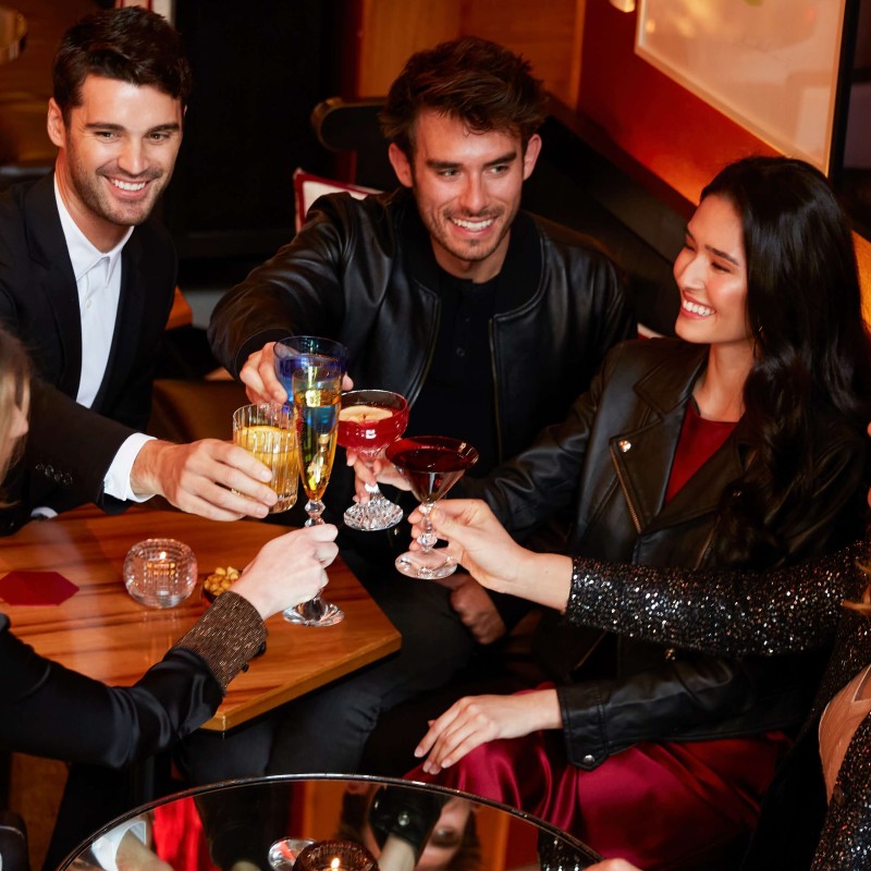 A group of friends toasting with champagne glasses