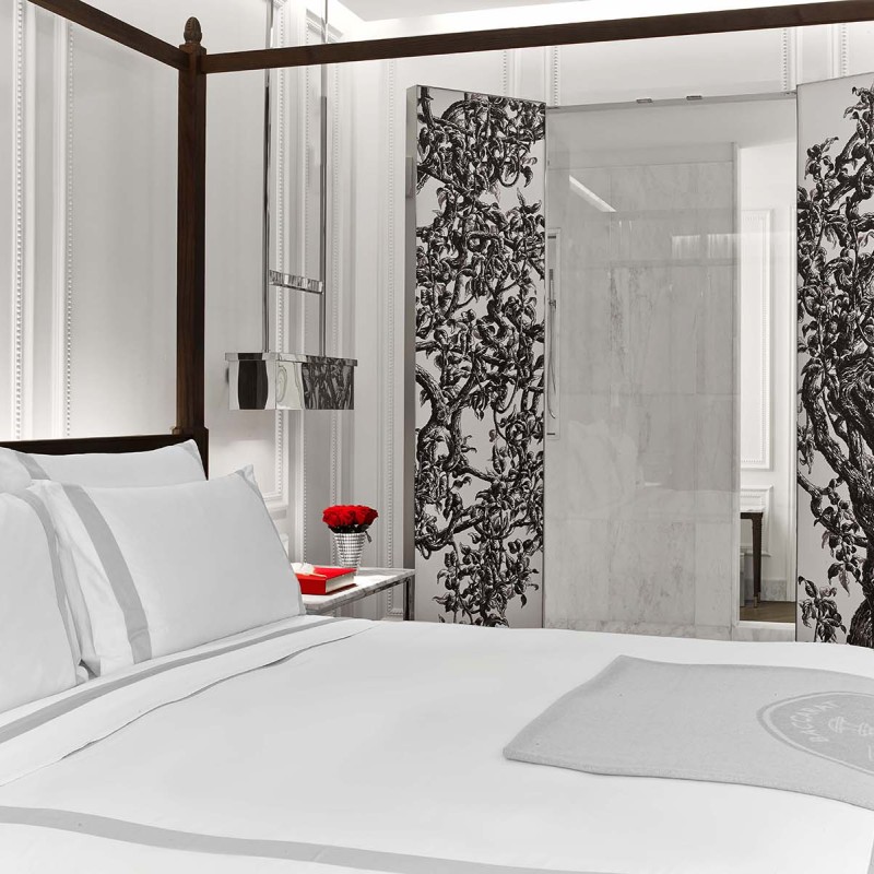 A view of. bed in a suite