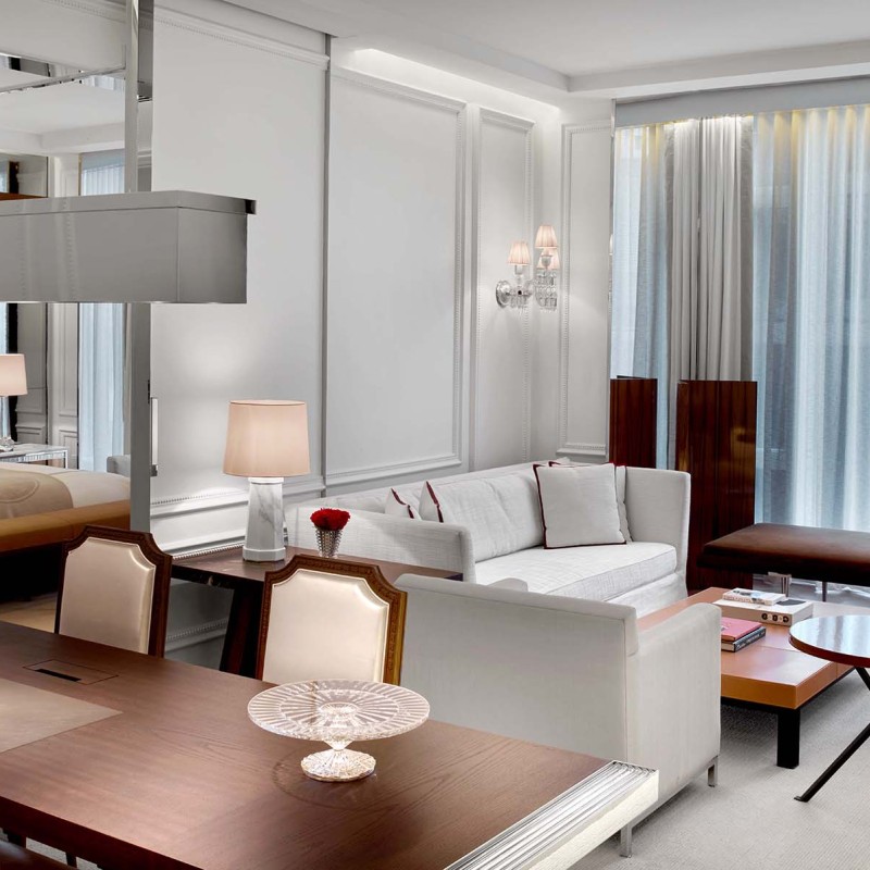 Dining room and living room in a Prestige Suite